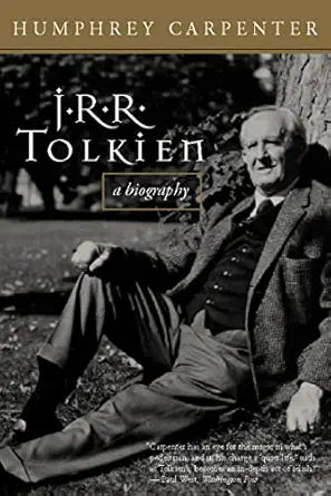 Book cover of 'J.R.R. Tolkien: A Biography' by Humphrey Carpenter with a black and white photo of Tolkien sitting outdoors.