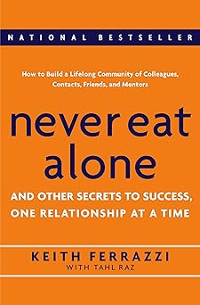 Book cover of 'Never Eat Alone' by Keith Ferrazzi with an orange background and blue banner.