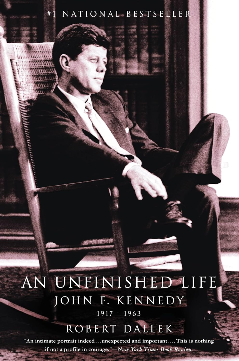 Book cover of 'An Unfinished Life' by Robert Dallek featuring a black and white photo of John F. Kennedy.