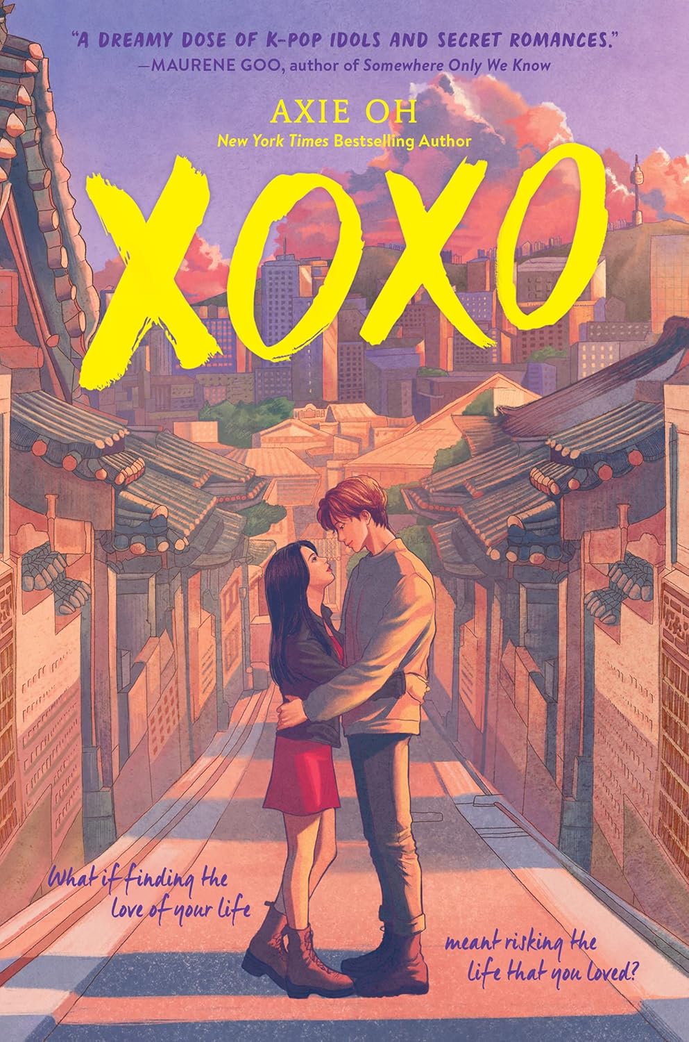 Book cover of 'XOXO' with a couple embracing in an urban setting.