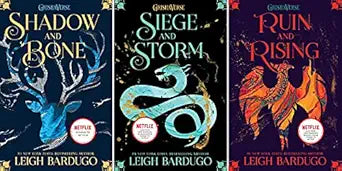 Three book covers of 'Shadow and Bone' series by Leigh Bardugo.