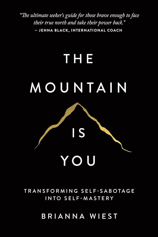 Book cover of 'The Mountain Is You' with a mountain illustration and text by Brianna Wiest on a black background.