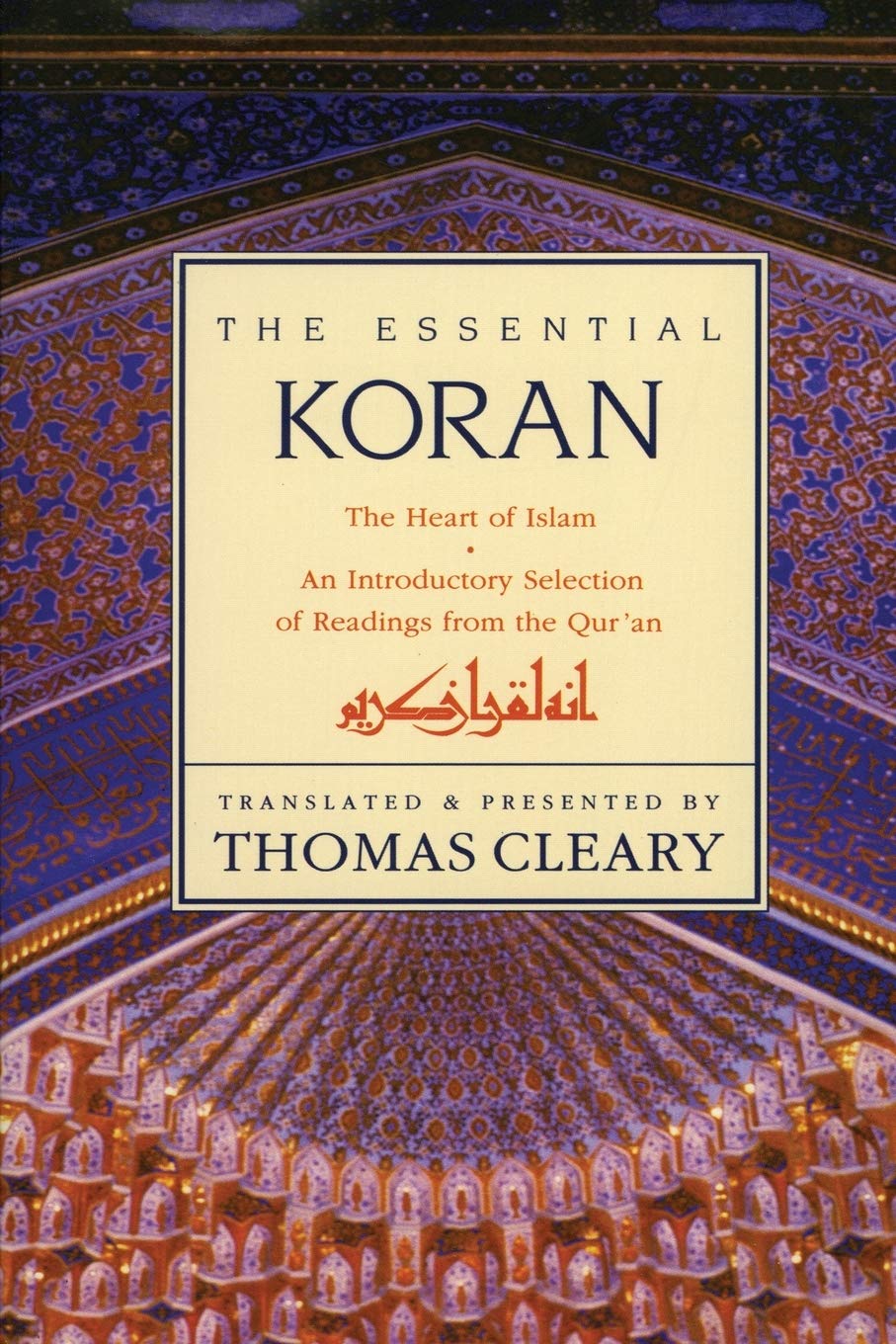 Book cover of 'The Essential Koran' with decorative background