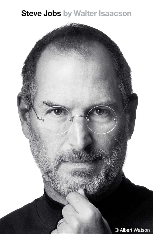 Black and white portrait of a famous person with text about the book 'Steve Jobs' by Walter Isaacson.