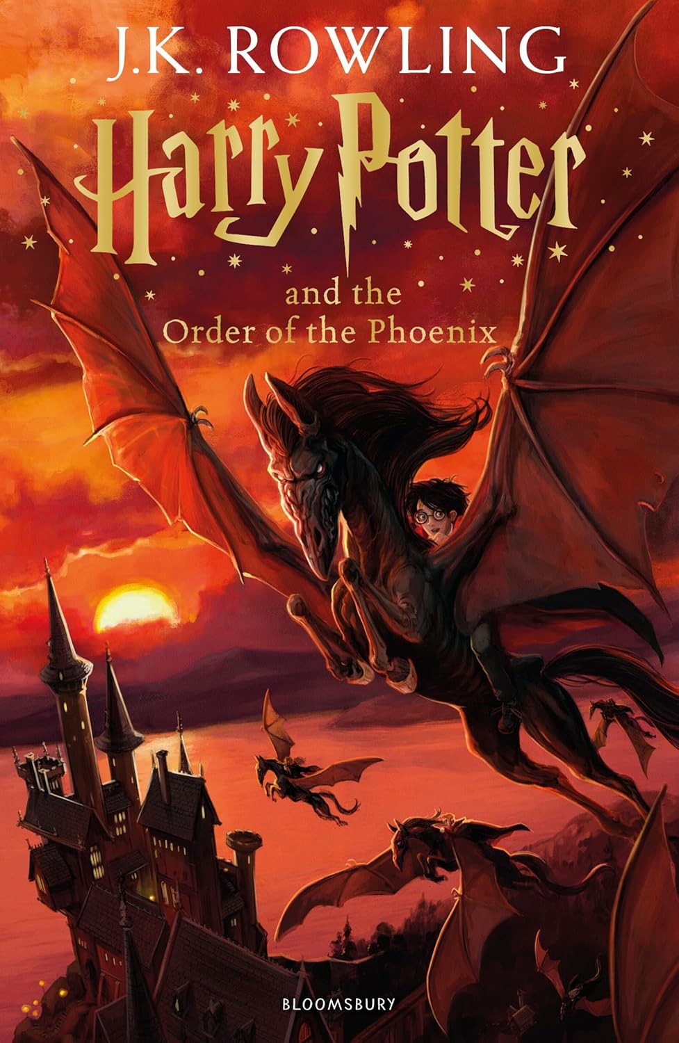 Book cover of 'Harry Potter and the Order of the Phoenix' with a dragon and castle in the background.