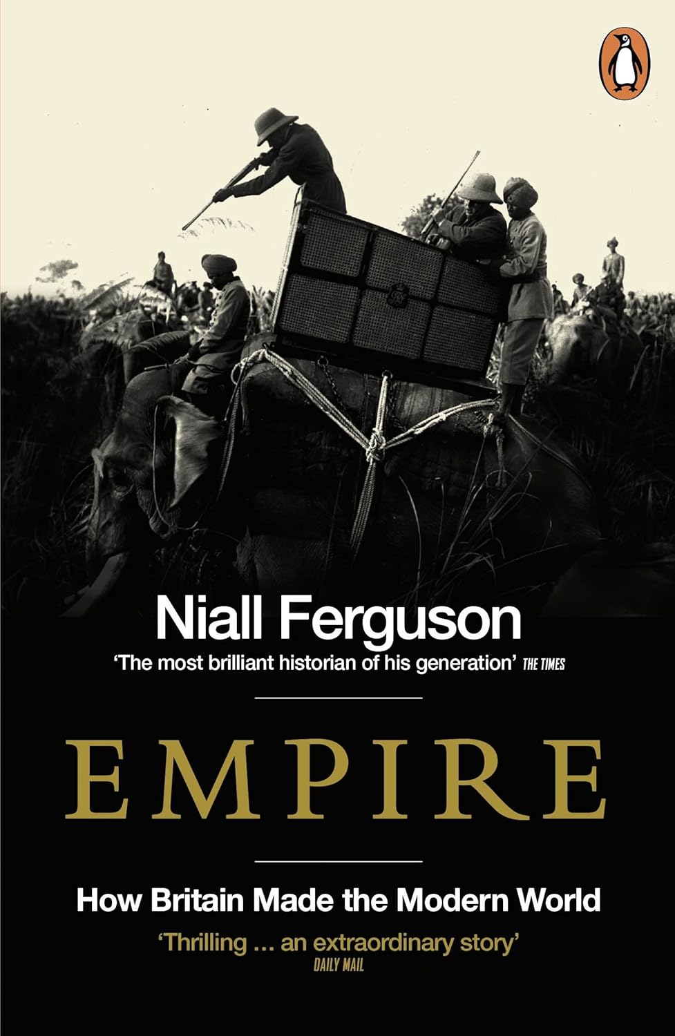 Book cover of 'Empire' by Niall Ferguson with a black and white image of people with luggage on a cart.