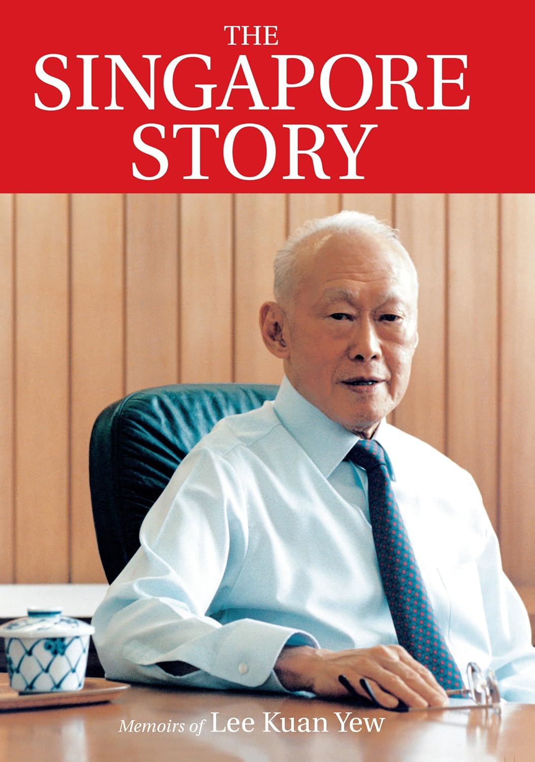Book cover of 'The Singapore Story' with a portrait of Lee Kuan Yew.