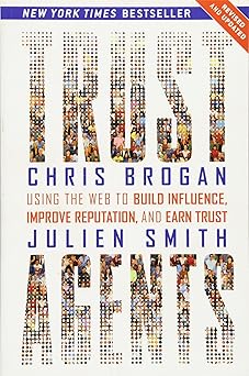 Book cover of ' tribes' by Chris Brogan and Julien Smith with a colorful design.