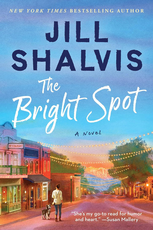 Book cover of 'The Bright Spot' by Jill Shalvis with a scenic town street and person walking a dog.