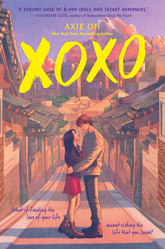 Book cover of 'XOXO' with a couple embracing in an urban setting.