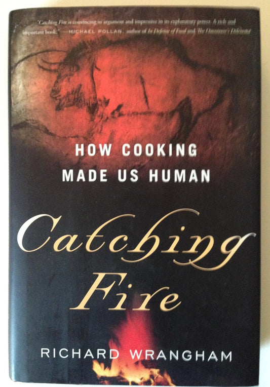 Book cover of 'Catching Fire' by Richard Wrangham
