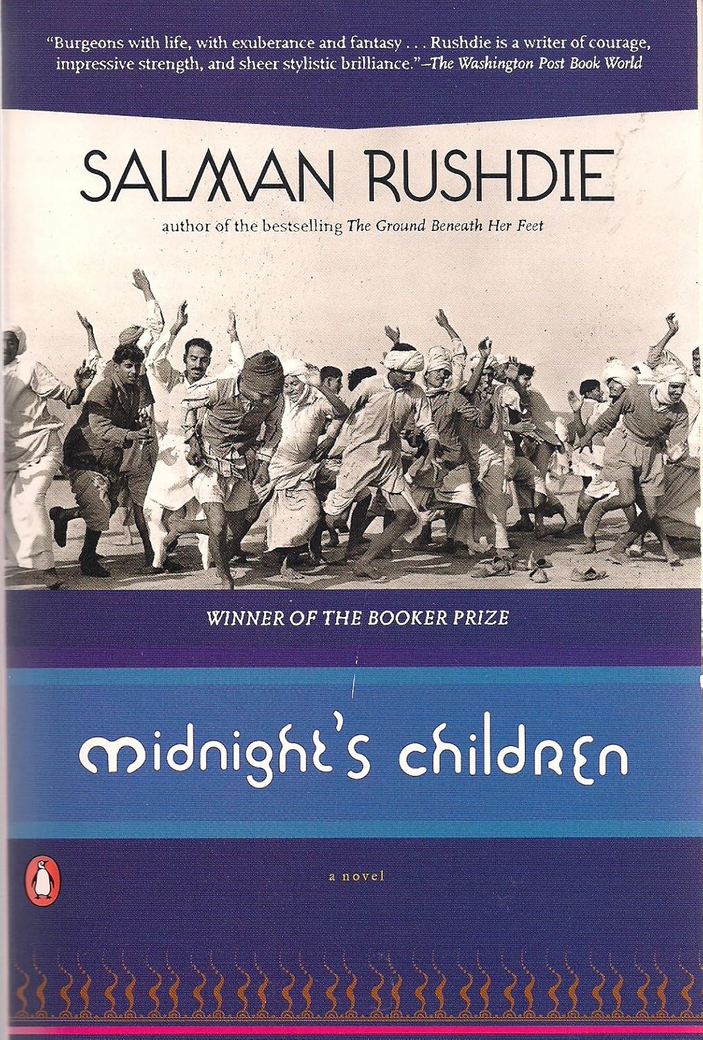 Book cover of 'Midnight's Children' by Salman Rushdie with a black and white photo of people celebrating.