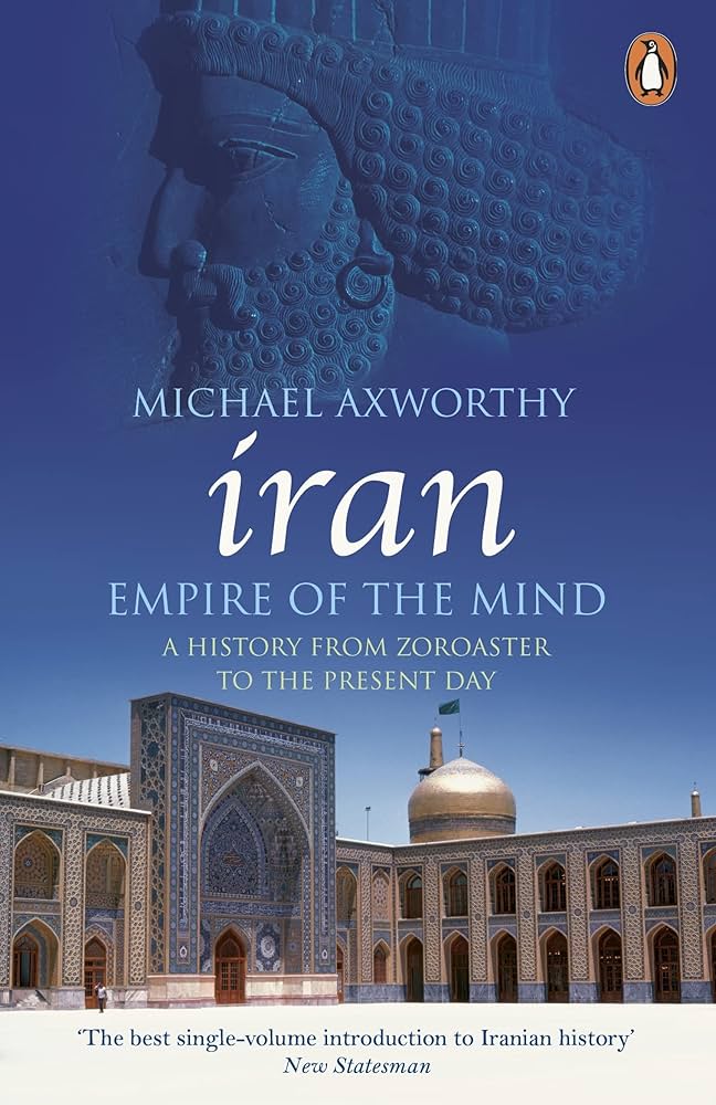 Book cover of 'Iran: Empire of the Mind' by Michael Axworthy with a blue background and architectural image.