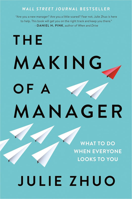 Book cover of 'The Making of a Manager' by Julie Zhuo with paper airplane graphics on a blue background.